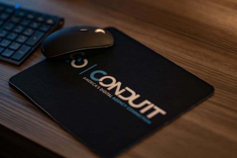 A Conduit-branded desk detail