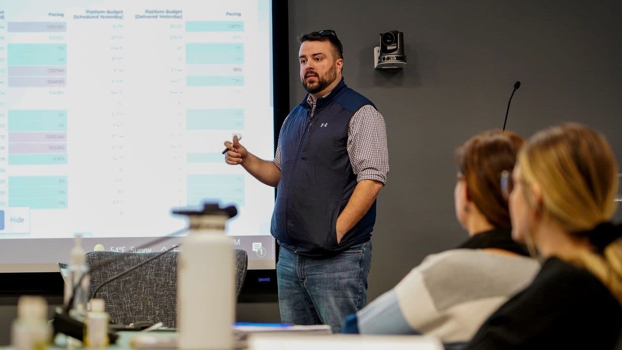 A Conduit specialist presenting a strategy at the whiteboard