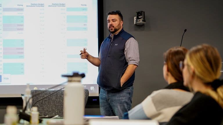A Conduit specialist presenting a strategy at the whiteboard