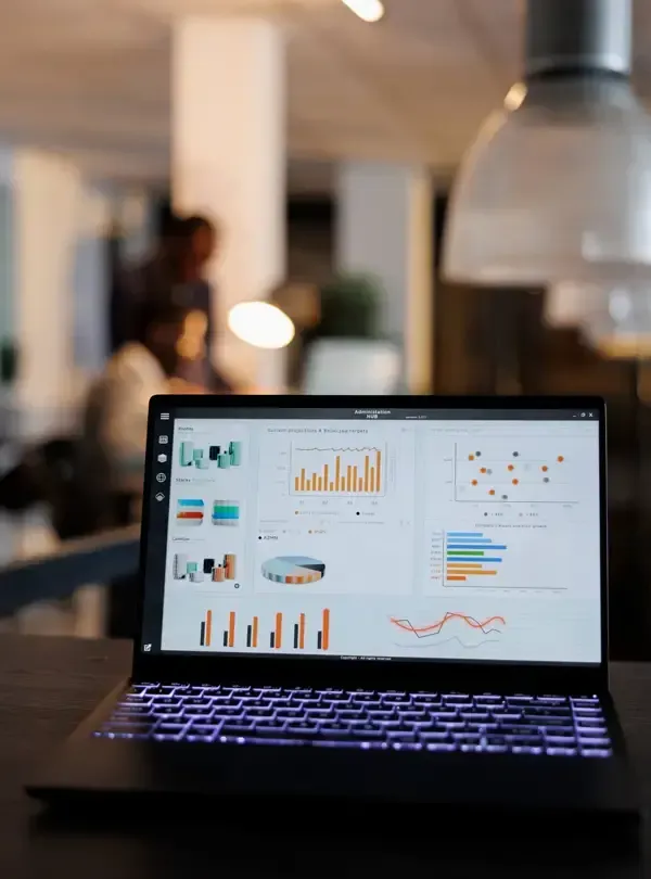 Laptop showing marketing performance statistics