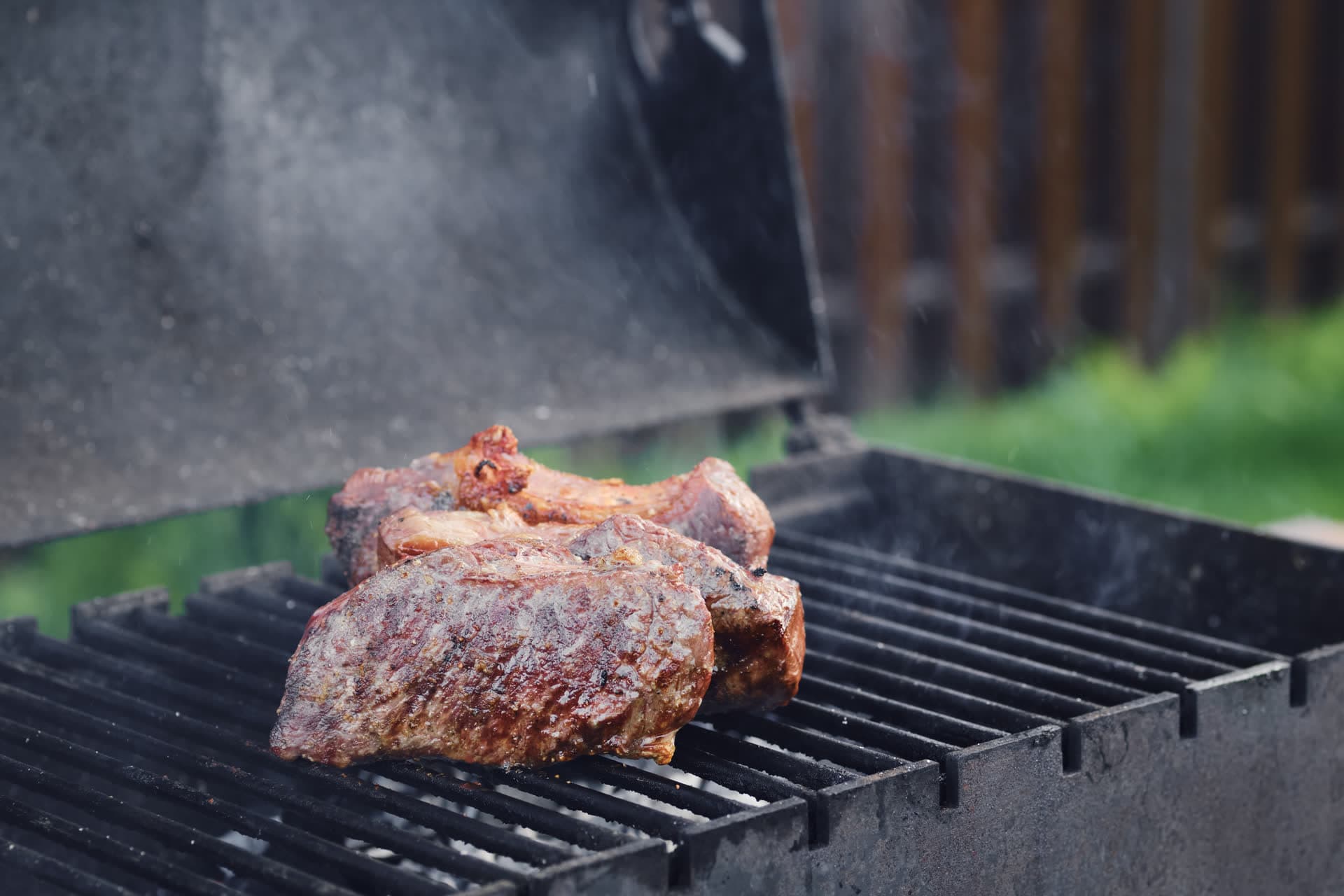 Close-up of a strip steak on the grill