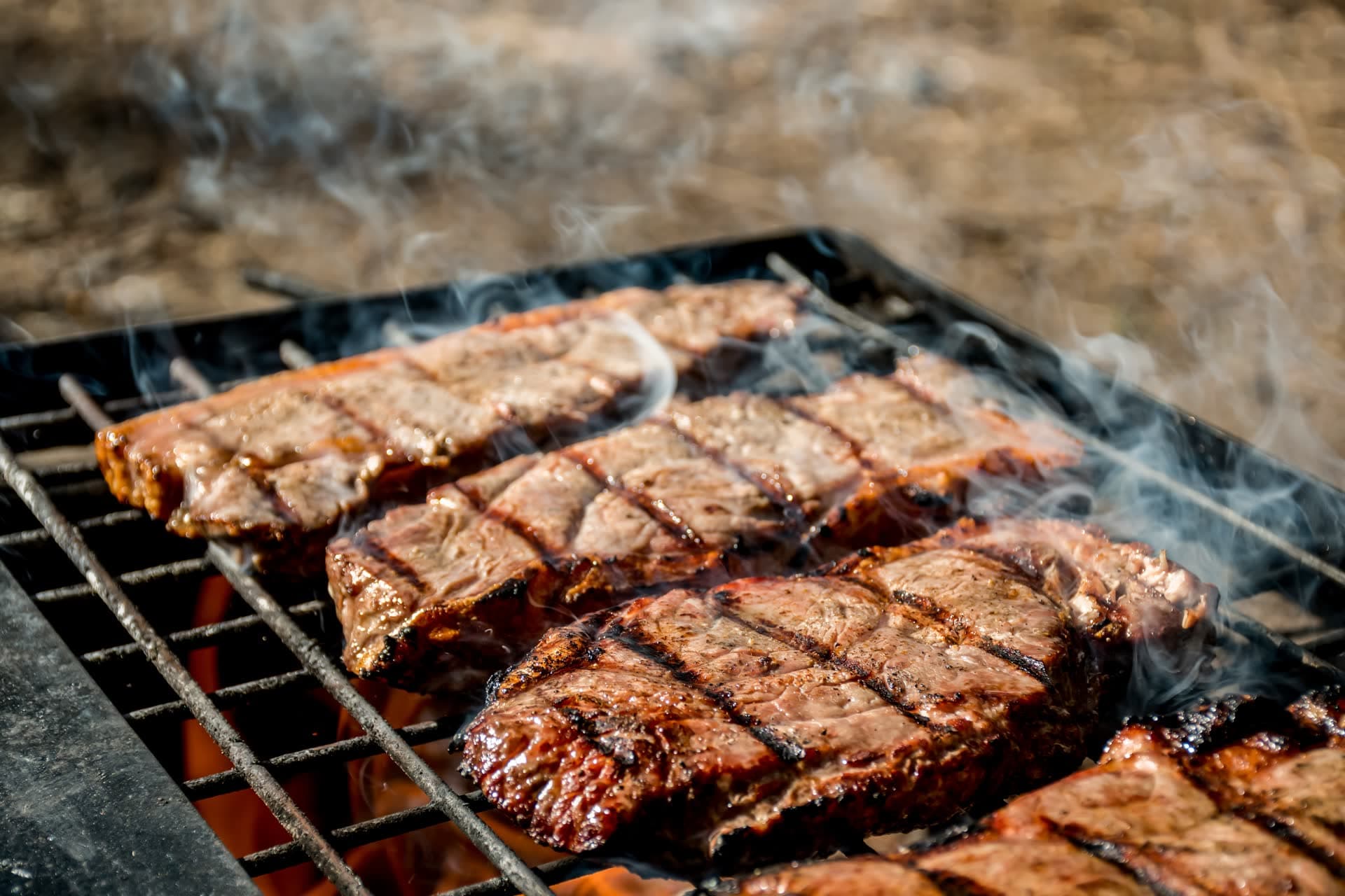 Steaks on a cast iron grill